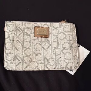 Calvin Klein Cream Monogram wristlet